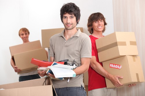 Professional movers loading a truck